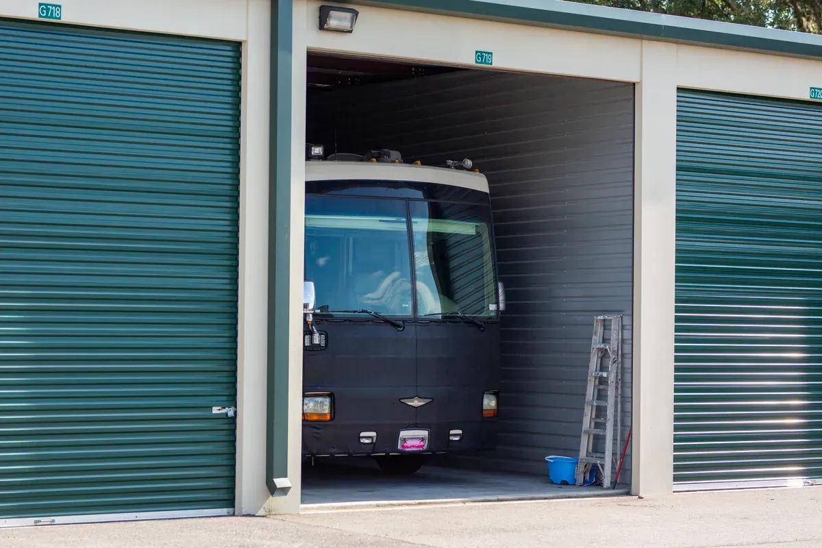 Enclosed parking with RV in it